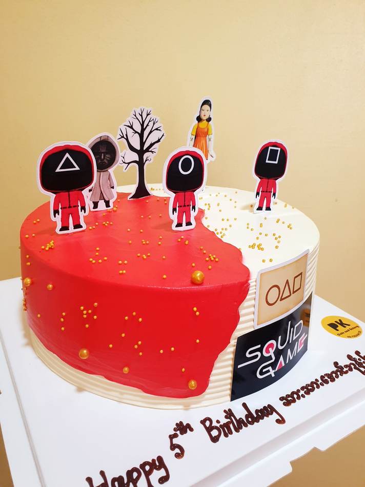Kids cake design - Superhero Figure Cake