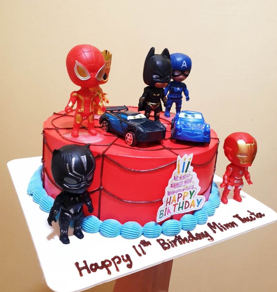 Kids cake design - Superhero Figure Cake